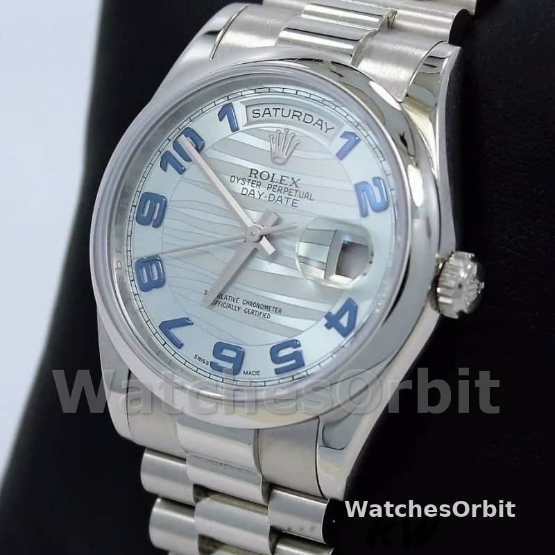 Rolex Day Date 118206 Wave Pattern Ice Blue Dial Arabic Numerals 36mm Unisex Replica Watch