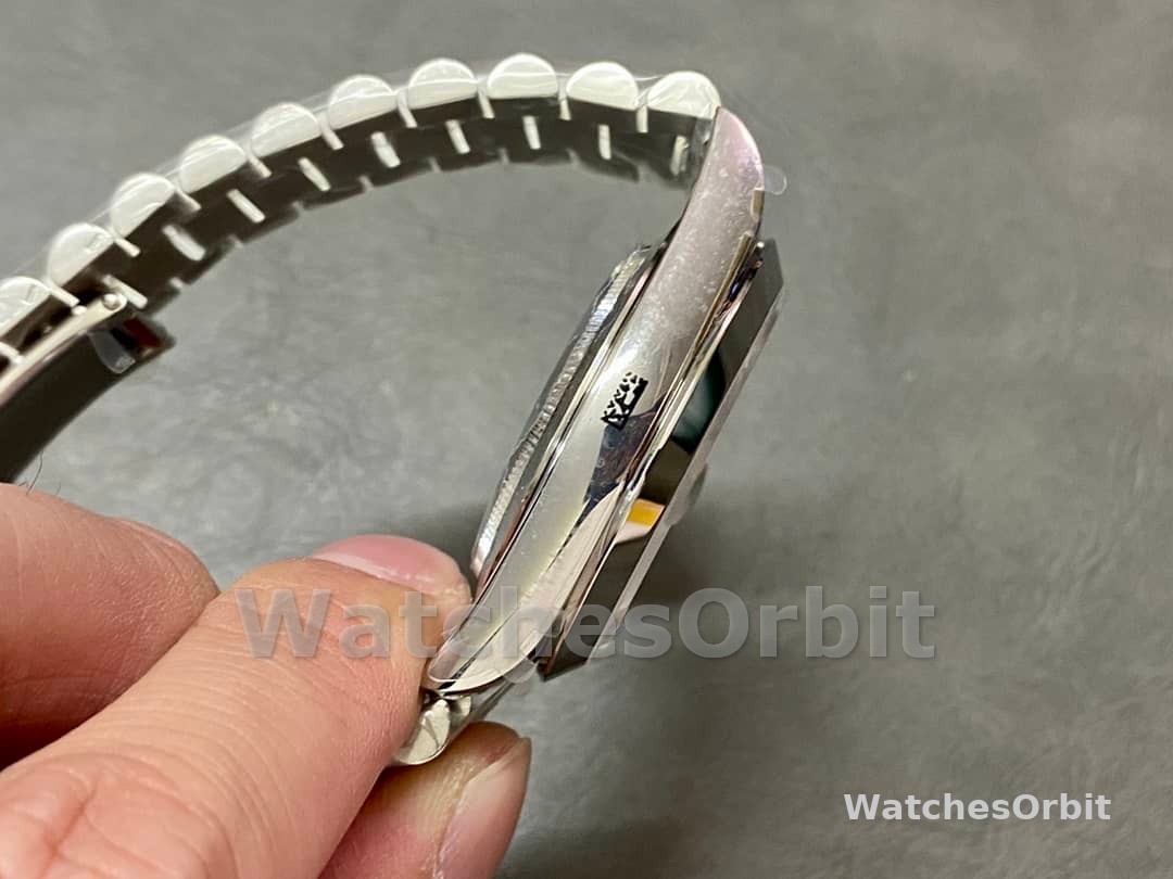 Rolex Day-Date 40mm Arabic Platinum Olive Dial 228206